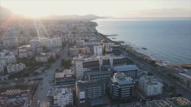This stock footage shows aerial view of Alanya, Turkey - a resort town on the seashore in 8K resolution
