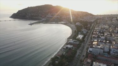 This stock footage shows aerial view of Alanya, Turkey - a resort town on the seashore in 8K resolution