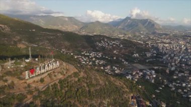 This stock footage shows aerial view of Alanya, Turkey - a resort town on the seashore in 8K resolution