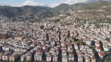 This stock footage shows aerial view of Alanya, Turkey - a resort town on the seashore in 8K resolution