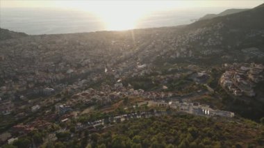 This stock footage shows aerial view of Alanya, Turkey - a resort town on the seashore in 8K resolution