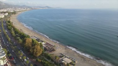 This stock footage shows aerial view of Alanya, Turkey - a resort town on the seashore in 8K resolution