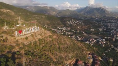 This stock footage shows aerial view of Alanya, Turkey - a resort town on the seashore in 8K resolution