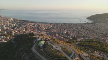 This stock footage shows aerial view of Alanya, Turkey - a resort town on the seashore in 8K resolution