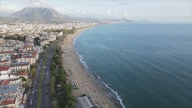 This stock footage shows aerial view of Alanya, Turkey - a resort town on the seashore in 8K resolution