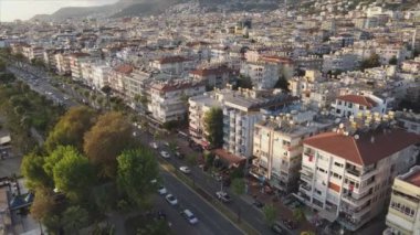 This stock footage shows aerial view of Alanya, Turkey - a resort town on the seashore in 8K resolution
