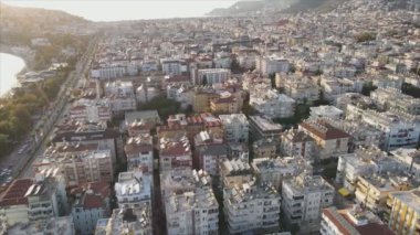 This stock footage shows aerial view of Alanya, Turkey - a resort town on the seashore in 8K resolution