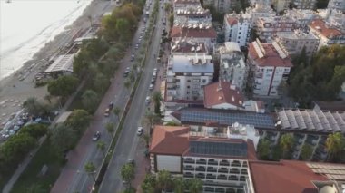 This stock footage shows aerial view of Alanya, Turkey - a resort town on the seashore in 8K resolution