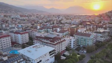 This stock footage shows aerial view of Alanya, Turkey - a resort town on the seashore in 8K resolution