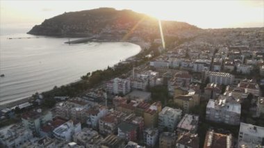 This stock footage shows aerial view of Alanya, Turkey - a resort town on the seashore in 8K resolution