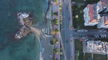 This stock footage shows aerial view of Alanya, Turkey - a resort town on the seashore in 8K resolution