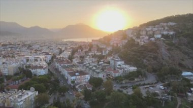 This stock footage shows aerial view of Alanya, Turkey - a resort town on the seashore in 8K resolution