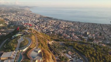 This stock footage shows aerial view of Alanya, Turkey - a resort town on the seashore in 8K resolution