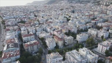 This stock footage shows aerial view of Alanya, Turkey - a resort town on the seashore in 8K resolution