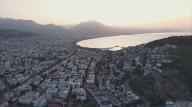 This stock footage shows aerial view of Alanya, Turkey - a resort town on the seashore in 8K resolution