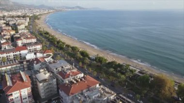 This stock footage shows aerial view of Alanya, Turkey - a resort town on the seashore in 8K resolution