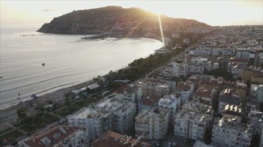 This stock footage shows aerial view of Alanya, Turkey - a resort town on the seashore in 8K resolution