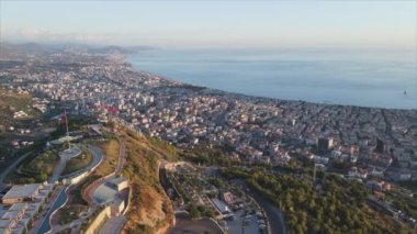This stock footage shows aerial view of Alanya, Turkey - a resort town on the seashore in 8K resolution