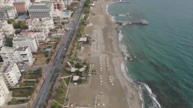 This stock footage shows aerial view of Alanya, Turkey - a resort town on the seashore in 8K resolution