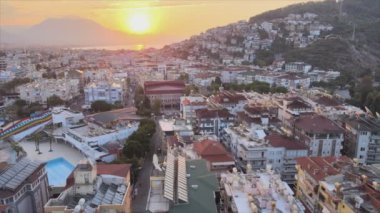 This stock footage shows aerial view of Alanya, Turkey - a resort town on the seashore in 8K resolution