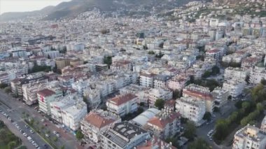 This stock footage shows aerial view of Alanya, Turkey - a resort town on the seashore in 8K resolution