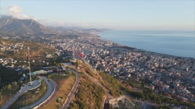 This stock footage shows aerial view of Alanya, Turkey - a resort town on the seashore in 8K resolution