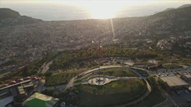 This stock footage shows aerial view of Alanya, Turkey - a resort town on the seashore in 8K resolution