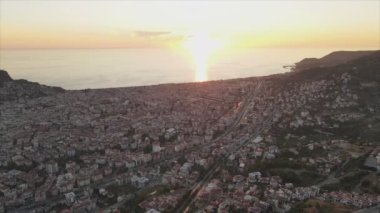 This stock footage shows aerial view of Alanya, Turkey - a resort town on the seashore in 8K resolution