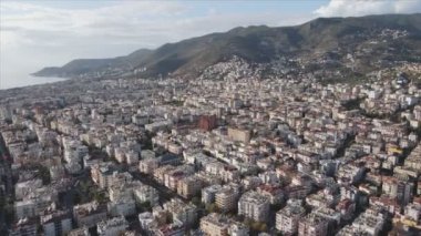 This stock footage shows aerial view of Alanya, Turkey - a resort town on the seashore in 8K resolution