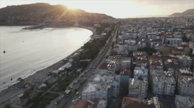 This stock footage shows aerial view of Alanya, Turkey - a resort town on the seashore in 8K resolution