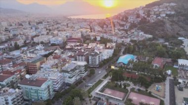 This stock footage shows aerial view of Alanya, Turkey - a resort town on the seashore in 8K resolution