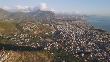 This stock footage shows aerial view of Alanya, Turkey - a resort town on the seashore in 8K resolution