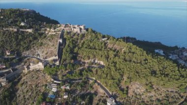 This stock footage shows aerial view of Alanya Castle, Alanya Kalesi in Turkey in 8K