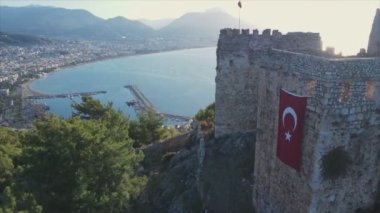 This stock footage shows aerial view of Alanya Castle, Alanya Kalesi in Turkey in 8K