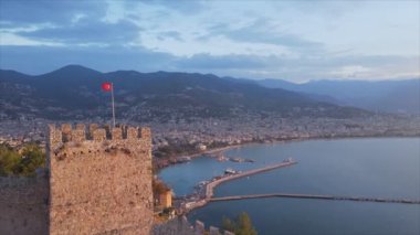 This stock footage shows aerial view of Alanya Castle, Alanya Kalesi in Turkey in 8K