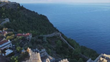 This stock footage shows aerial view of Alanya Castle, Alanya Kalesi in Turkey in 8K