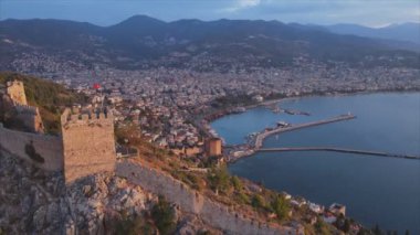 This stock footage shows aerial view of Alanya Castle, Alanya Kalesi in Turkey in 8K