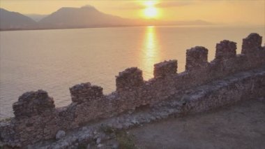 This stock footage shows aerial view of Alanya Castle, Alanya Kalesi in Turkey in 8K