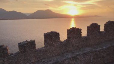 This stock footage shows aerial view of Alanya Castle, Alanya Kalesi in Turkey in 8K