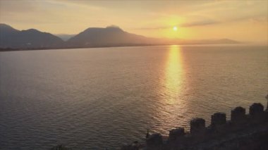 This stock footage shows aerial view of Alanya Castle, Alanya Kalesi in Turkey in 8K