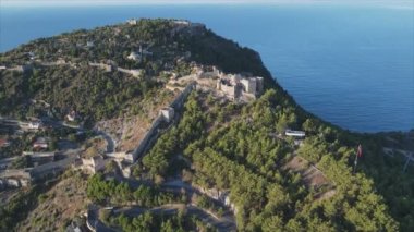 This stock footage shows aerial view of Alanya Castle, Alanya Kalesi in Turkey in 8K