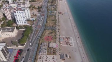 This stock footage shows aerial view of Antalya, Turkey - a resort town on the seashore in 8K resolution