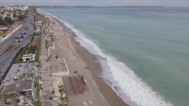 This stock footage shows aerial view of Antalya, Turkey - a resort town on the seashore in 8K resolution