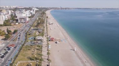 This stock footage shows aerial view of Antalya, Turkey - a resort town on the seashore in 8K resolution