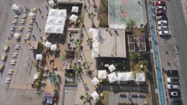This stock footage shows aerial view of Antalya, Turkey - a resort town on the seashore in 8K resolution