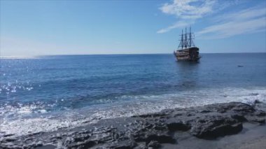 This stock footage shows aerial view of beach at the seaside resort town in Turkey in 8K resolution