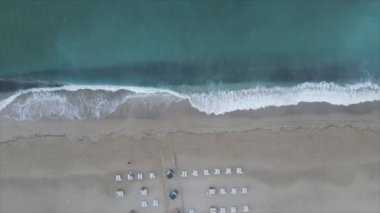 This stock footage shows aerial view of beach at the seaside resort town in Turkey in 8K resolution