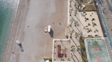 This stock footage shows aerial view of beach at the seaside resort town in Turkey in 8K resolution