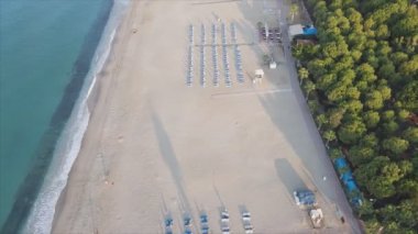 This stock footage shows aerial view of beach at the seaside resort town in Turkey in 8K resolution