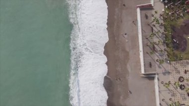 This stock footage shows aerial view of beach at the seaside resort town in Turkey in 8K resolution